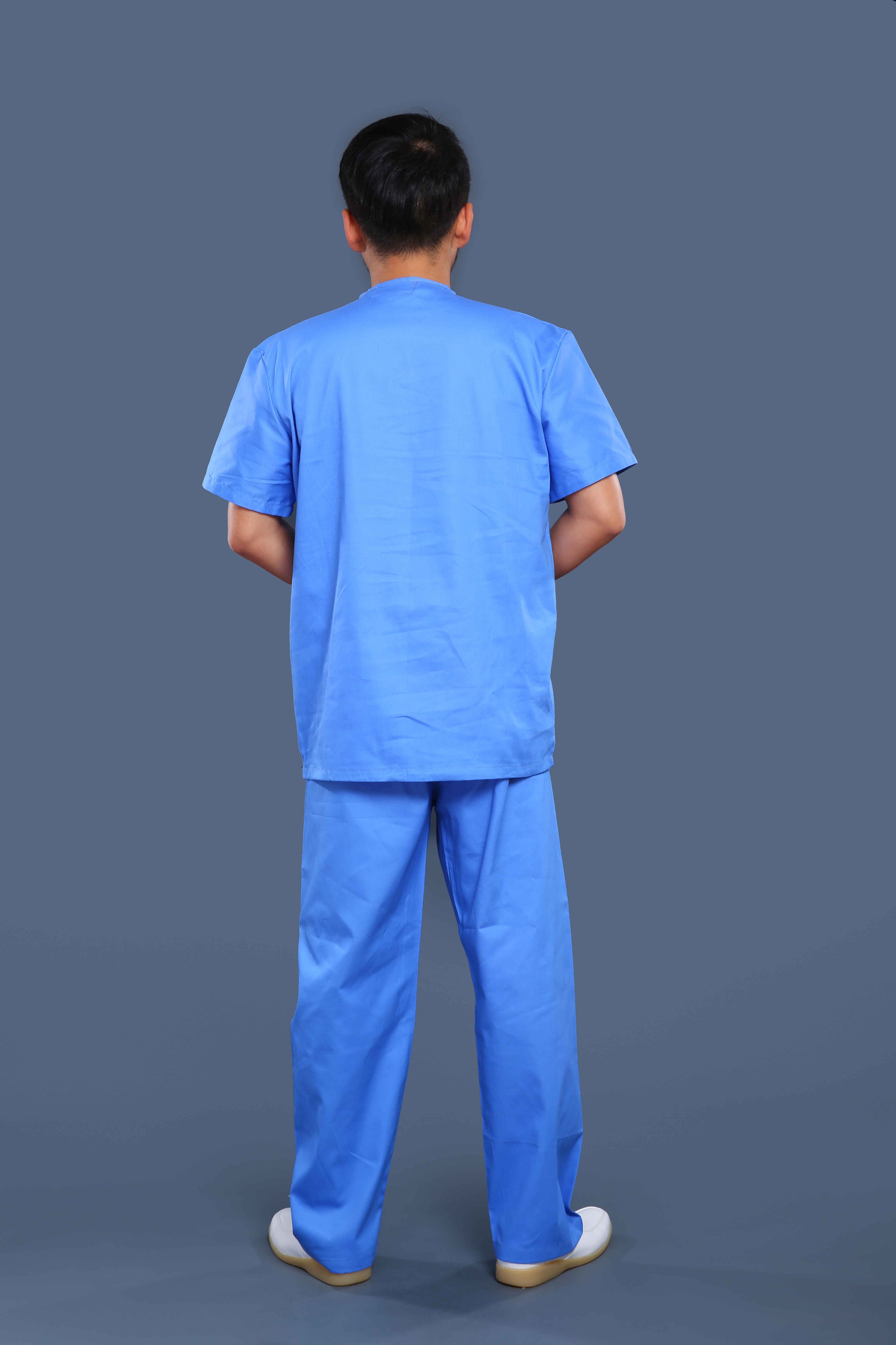 藍(lán)色洗手衣背面照